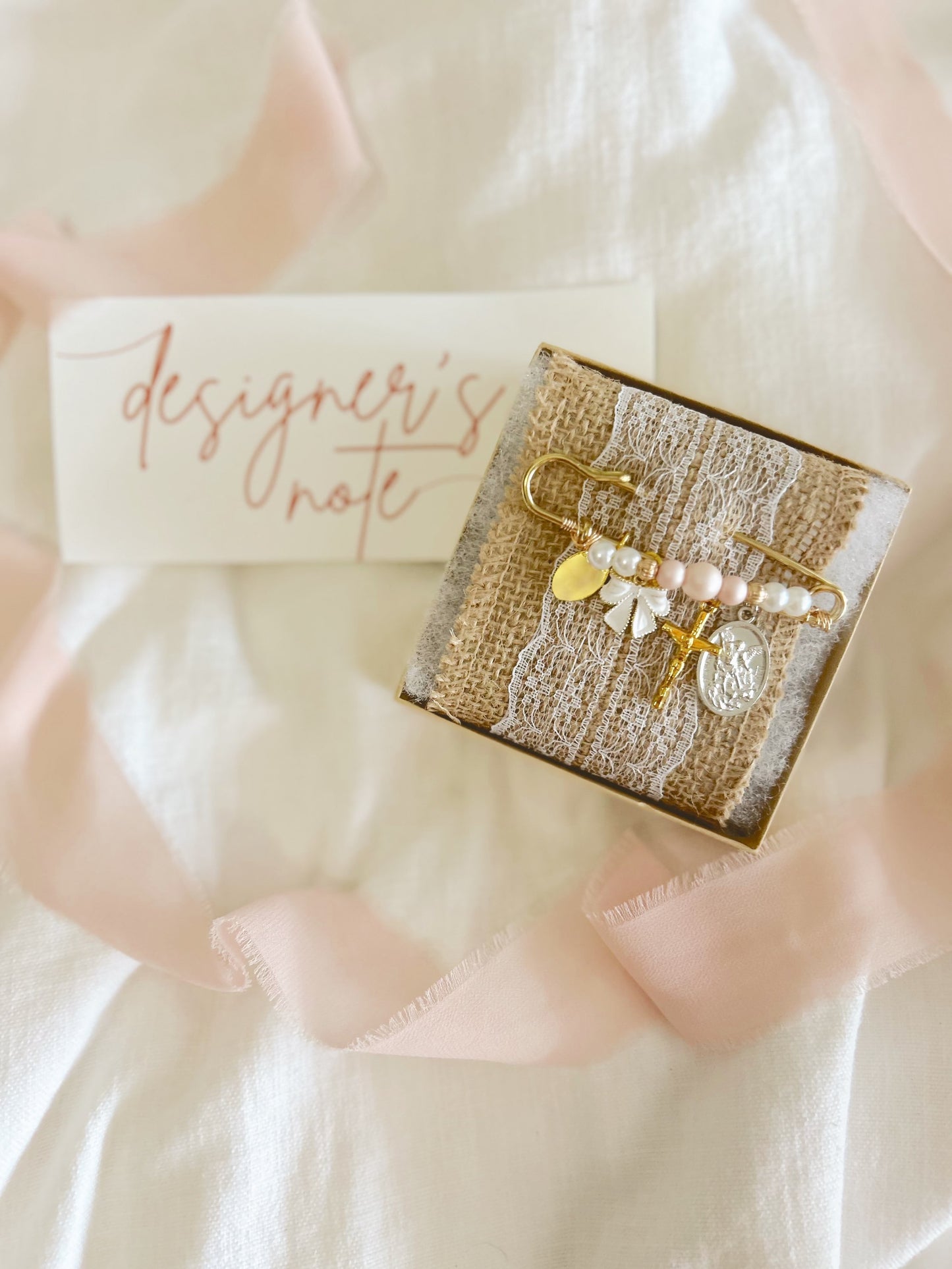 Clara’s Pink Pearl Bow Pin image 0